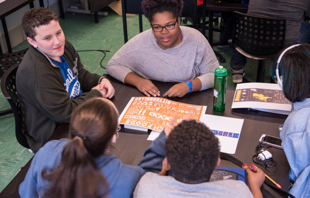 Students at Bard High School Early College looking at posters sent by Dutch students in the exchange program (Photo by Jaclin Paul)